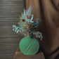 Vase mit Trockenblumenstrauß Grünes Blatt